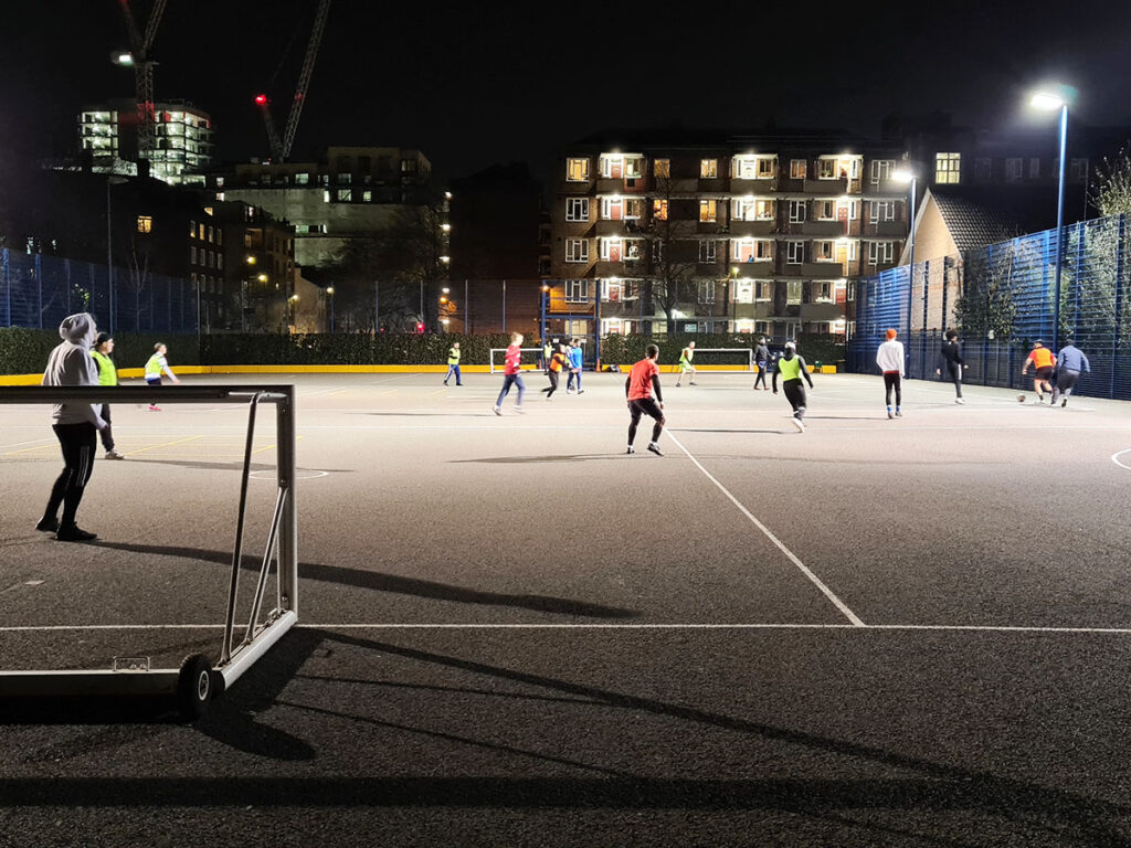 community football in gb at night